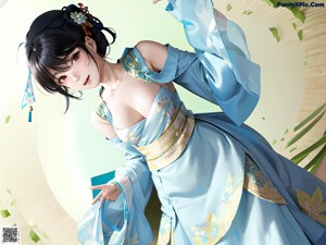 A woman in a blue kimono sitting on a bed.