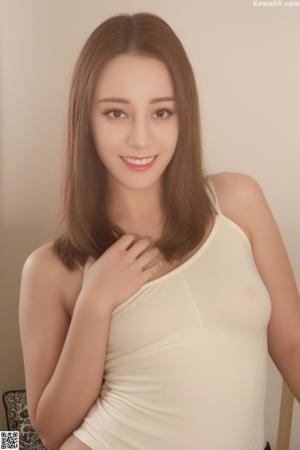 A woman in a red lingerie posing for the camera.